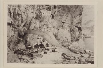 Camp at Shinumo Creek. Dodge under fly. Kolb in boat. From 5x7 print in Lint album
