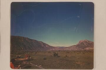 Camp at Smith Ferry. Flaming Gorge in background