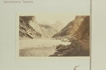Up river from below Waltenberg Rapid. The sun-lighted wall at upper left is above the mouth of Waltenberg Canyon