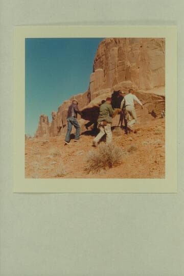 Disney special effects crew carrying rock to location at Park Avenue in the Arches National Monument. Filming of "The Colorado River Story."