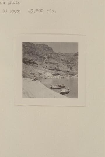 Repairs to motors of "Bootoo" after hitting island at foot of Forster Rapid.  Preliminary Bright Angel gauge:  49,800 cfs