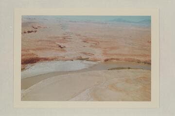 Up Bullfrog Creek. The Henry Mountains are at upper right