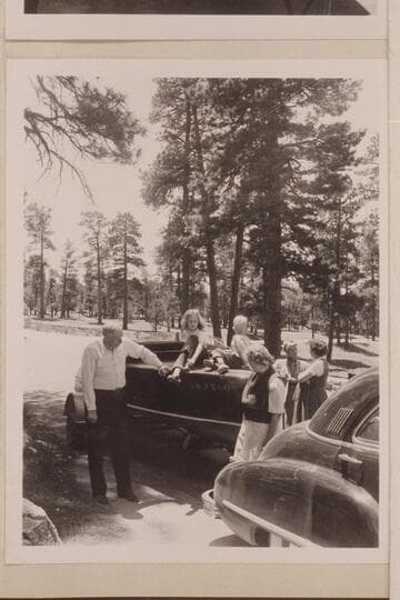 Grandchildren of Dr. and Mrs. Bryant aboard the "BOO" at Grand Canyon, south rim. Dr. Harold Bryant at the left. Mrs. Bryant at the bow of the boat. Margaret Marson 2nd from right
