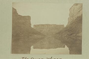 The Quiet Water above Soap Creek Rapid. Which way does the canon turn? Snap-shot from boat by R. B. Stanton, 1889. Dupe presented by Anne Stanton Burchard, 1959, Jan