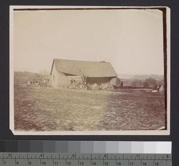 Wrecked adobe house