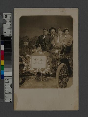 Portrait of four men in a car, Venice, California