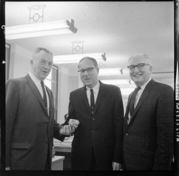 Three men in suits