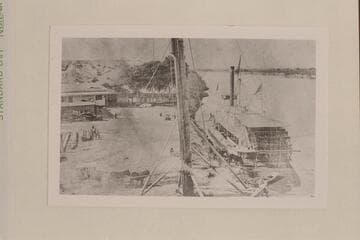 "Mohave" (I) (?) This photograph shows steamboat landing and ferry at Fort Yuma. Note the stage coach at lower left