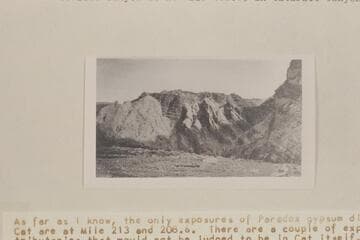 Near view of gypsum plug shown in Plate 4A looking downstream in tributary canyon. The contact of the gypsum cuts across Hermosa strata at the right. Side canyon is at Mile 206.85 in Cataract Canyon