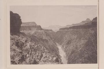 Grapevine Rapid which Stanton thought was Dockdologer Rapid. The photo is taken from the top of the pre-Cambrian and a typical Tonto cliff shows at left