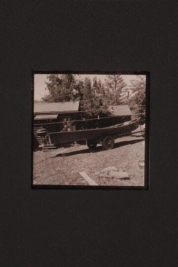 Rogue River type of boat. Two boats at Agness on the Rogue River. Outboard motor on stern of one boat