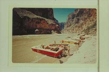 The "Big Red" hauled onto the beach for replacement of the thrust bearing which burned out at Mile 164. Hundred Sixty-four Mile Canyon