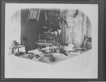 A dining room table set for dinner at superintendent's house at Mill Creek #1 Hydro Plant. Related to S-