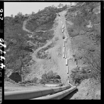 2-6 Tule Siphon - Distributing pipe along intake slope from "16" draw