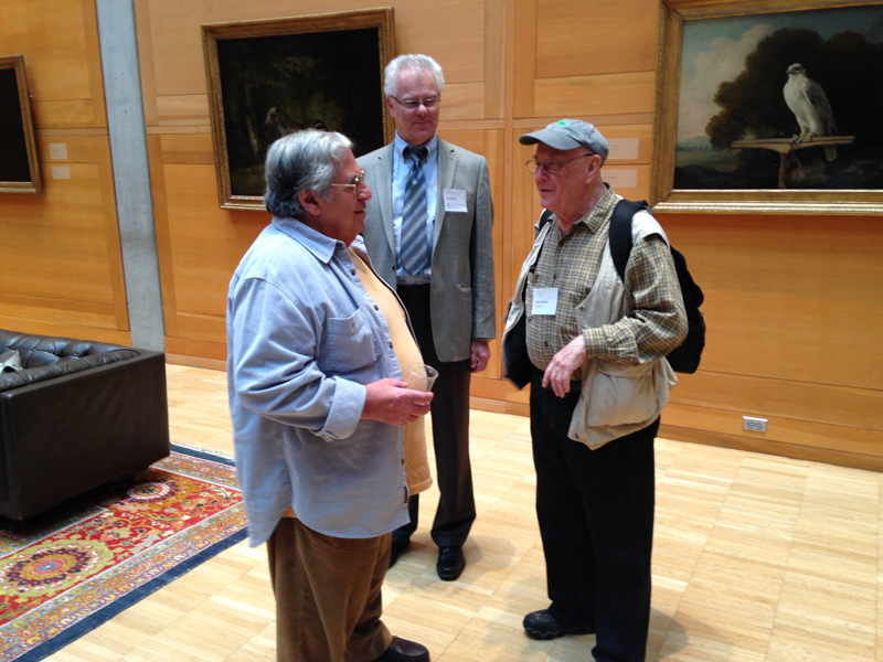 Photographers Paul Caponigro (left) and Bruce Davidson (right) meet for the first time at a new exhibition of their work at the Yale Center for British Art. Exhibition co-curator Scott Wilcox (center) says of the pair: “Davidson is a photojournalist and exponent of gritty street photography while Caponigro practices a pure, formalist approach to photographing landscape. If Davidson seeks to capture a specific moment in time, Caponigro dwells on the timeless phenomena of nature in relation to the enduring man-made structures of antiquity, such as Stonehenge.”